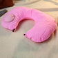 Close-up of manual air valve on inflatable travel neck pillow