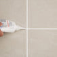 Freshly sealed tiled floor showing clean grout lines after application of the gap filler.