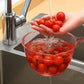 Side view showing easy-pour spout and drain slot on kitchen washing bowl