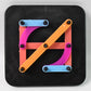 Brightly coloured alphabet numeric puzzle pieces arranged in a grid pattern.