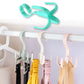 The GlimmerHome 360-degree rotatable purse hanger hook from another angle, showing its versatility.