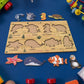 Detailed view of the smooth, child-safe wooden pieces of the sea animal puzzle.