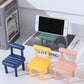 Detailed view of the Mini Chair Phone Stand's construction and ergonomic design.