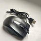 Packaging of the Compshop wired optical mouse, showcasing the product inside the box.