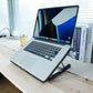 Laptop cooling pad with a gaming laptop placed on top, showing effective cooling in use.