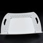 Foldable serving tray ready for use in a kitchen setting, perfect for everyday meals or outdoor gatherings.