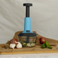 Detailed view of the sharp, triple stainless steel blades inside the food chopper for precision.