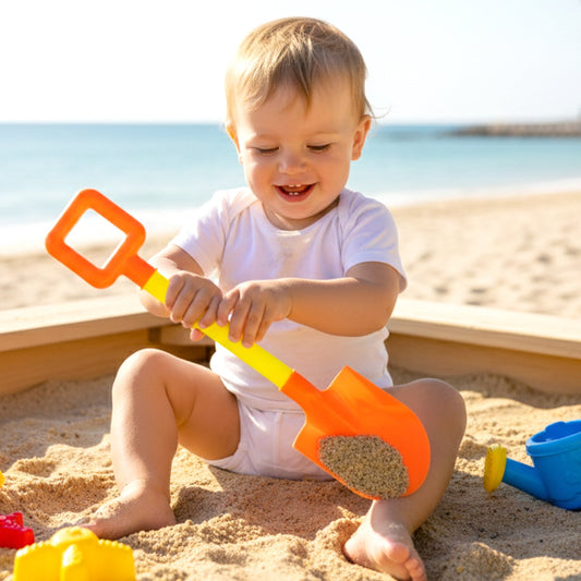 Brightly colored plastic beach spade designed for kids' outdoor play