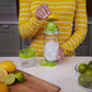 Demonstration of the juice maker bottle's removable bottom cap for easy citrus juicing and cleaning.