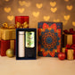 Luxury designer gift box containing Kesar Pista Almonds and golden bottle
