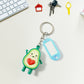 Avocado cartoon keychain accessory with heart detail for keys and backpacks