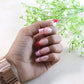 Glossy artificial nail tips in soft nude color for daily wear