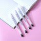 Close-up of black gel pens highlighting smooth writing and quick-drying ink