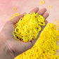 Bright orange elastic rubber bands bundled together