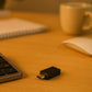 USB OTG adapter plugged into a tablet, demonstrating its plug-and-play functionality.