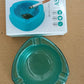 Plastic ashtray with anti-slip base ensuring firm grip on surfaces