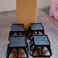 Plastic washing machine stand set placed in laundry room for appliance elevation
