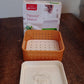 Square Paneer Maker and its packaging, showcasing the product clearly.