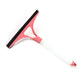 Achieving crystal-clear results on a home window with the multi-surface squeegee.