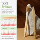Bamboo toothbrush holder mounted on bathroom wall for space-saving