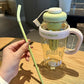 Transparent ice cream themed water jug with strap and fruit infusion feature