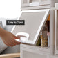 Wardrobe storage drawers used for kitchen organization, holding spices and jars.