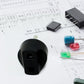 The  2 Pin Plug Adapter displayed with its retail color box packaging.