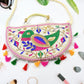 Stylish Jaipuri handbag featuring a unique floral embroidery design and sturdy strap.