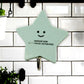 A set of strong self-adhesive hooks displayed neatly on a tiled kitchen wall, ready for use.