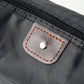 Handheld travel bag designed for toiletries and personal care essentials