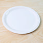Round serving plate made of durable food-safe plastic material