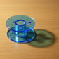 Bobbin set laid out for use with domestic sewing machines
