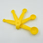 Stackable plastic measuring spoons with a convenient storage ring.