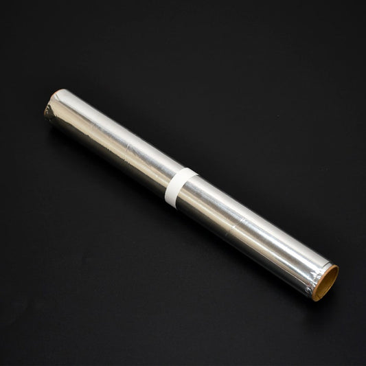 Heavy duty non-stick aluminum foil roll for baking and grilling.