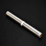 Heavy duty non-stick aluminum foil roll for baking and grilling.