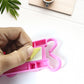 Pink multi-purpose hanging organizer folded to save space