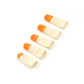 Assortment of white silicone finger protectors on a clean surface