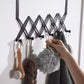 Durable steel 6-hook door hanger, ready for easy, no-drill installation.