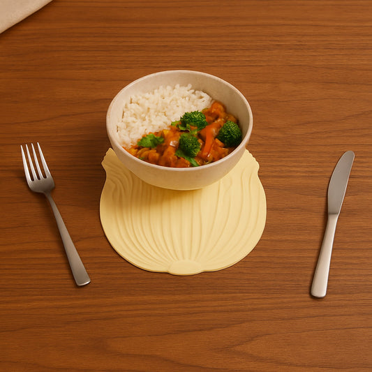 Close-up of a heat-resistant silicone leaf coaster with detailed embossed texture