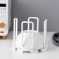 Stylish plastic kitchen organizer rack on a countertop next to a sink, ready for use.