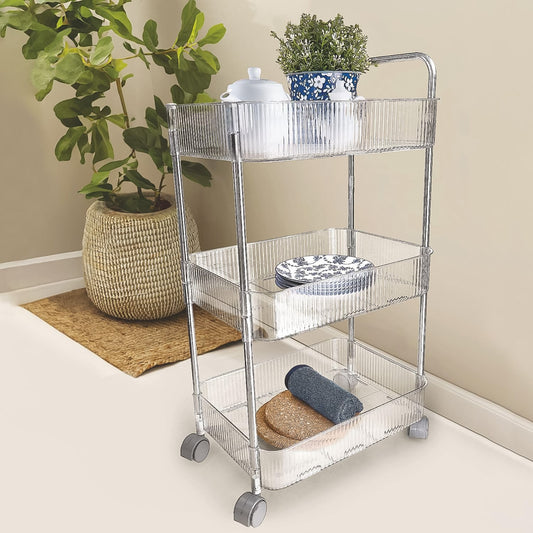 Close-up of transparent plastic baskets on 3-layer storage trolley