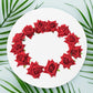 Back view of the red velvet rose hair clip, showing the secure clasp mechanism.