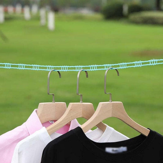 Clothesline rope securely holding clothes outdoors, perfect for camping.