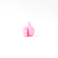 Side profile of pink silicone hand clip wall holder for organizing cables