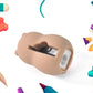 Angled view of cartoon pencil sharpener with built-in eraser