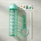Hand holding motivational water bottle during workout or outdoor activity