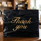 Reusable shopping bag with Thank You print ideal for retail use