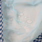 Hair catcher detail on the hair cutting cape
