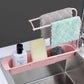 Adjustable over-sink caddy fitted securely on a kitchen sink holding kitchen tools