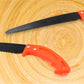 Detailed view of the teeth on the high carbon steel blade of the hand pruning saw.